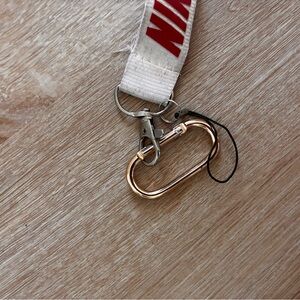 Nike White Lanyard with Red Logo and Gold Clip